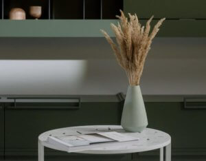 mint coloured ceramic vase with dried flowers